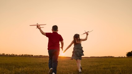 happy boy girl child play airplane pilot sunset, children family dream flying, school bell rings,...