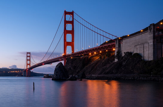 Pre-dwan image of the Golden Gate Bridge in San Francisco with glow from the bridge lights