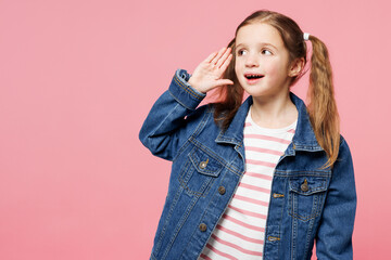 Little child cute kid girl 7-8 years old wear denim shirt have fun try to hear you overhear listen...