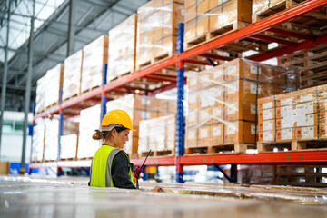 operation worker woman checking and inspecting cargo for stack items for shipping. Staff checking the store factory. industry factory warehouse. Worker Scanning Package In Warehouse.