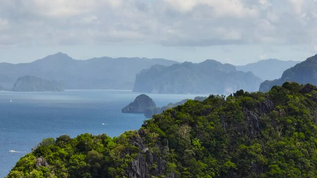 Blue sea and Islands under the cloudy sky in El Nido, Palawan. Philippines.