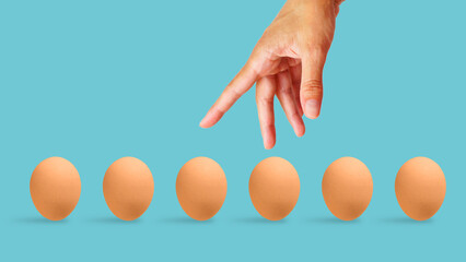 Diversification and risk management. Do not put all eggs in one basket. Collage with the hand which...