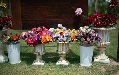 Fake flowers In the garden, on the grass