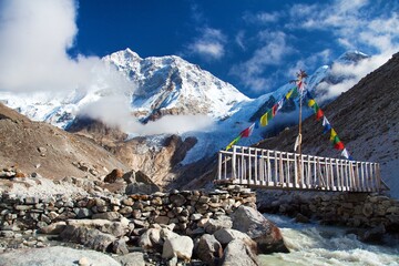 Mount Makalu with clouds, vooden bridge, Nepal Himalayas