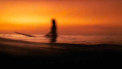 Abstract Sufer at sunset panoramic