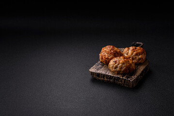Delicious fresh fried minced fish cutlets with spices and herbs