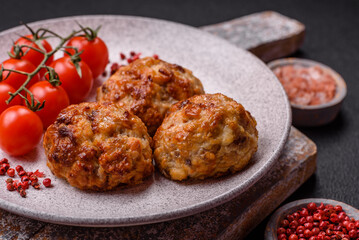 Delicious fresh fried minced fish cutlets with spices and herbs