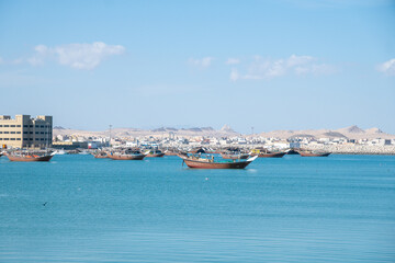 Fototapeta na wymiar Arabian Sea, fishing boats, Oman, cities of Arabia