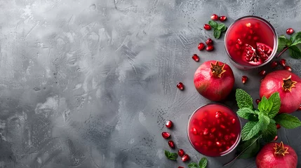 Keuken foto achterwand Koffiebar Ripe red pomegranate. Ripe grains of pomegranate on the table. Pomegranate juice,Ripe pomegranates with leaves. On a rustic background,Fresh and healthy pomegranate on a grey background, 