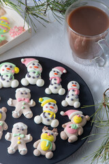 Christmas marshmallows. Winter candy. Sweet food in december. Snowman and Santa Claus