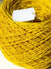 Raffia is yellow. Close-up of a skein of ECO raffia. Eco material for handmade work.