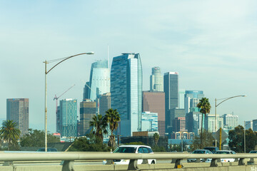 Santa Monica freeway sign with downtown Los Angeles on the background California