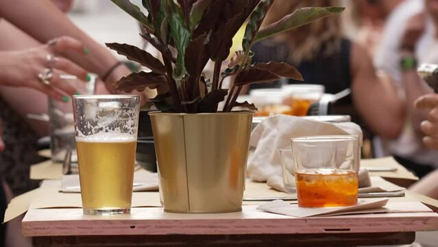 aperitif with cocktails outdoors with friends
