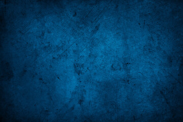 Dark blue textured concrete grunge wall background