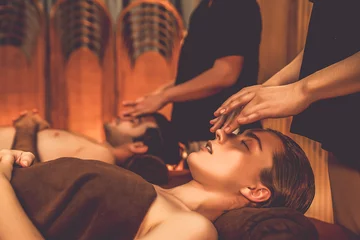Poster Couple customer enjoying relaxing anti-stress head massage and pampering facial beauty skin recreation leisure in warm candle lighting ambient salon spa in luxury resort or hotel. Quiescent © Summit Art Creations
