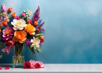 Fotobehang Un bouquet de fleurs coloré dans un vase pour la fête des mères sur un fond bleu turquoise © infographiste06