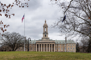 The Old Main building on the campus of Penn State University in wintertime, State College, Pennsylvania.	 - 750131297