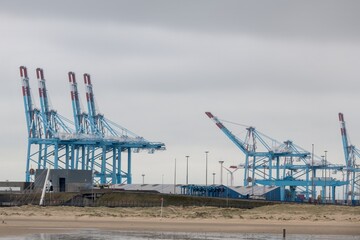 Fototapeta na wymiar port cranes at the port of zeebrugge in belgium