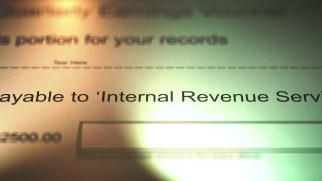 Camera Slides over Payment Voucher to the Internal Revenue Service