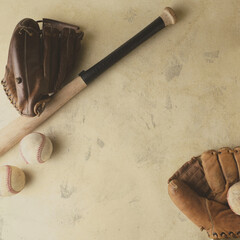 Vintage retro baseball background with flat lay of used equipment on brown texture with copy space. - 750138605