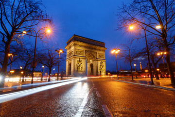 The Triumphal Arch in rainy evening, Paris, France. - 750141291