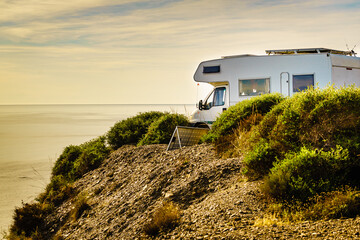 Caravan camping on coast, Spain. - obrazy, fototapety, plakaty