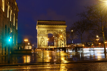 The Triumphal Arch in rainy evening, Paris, France. - 750147238