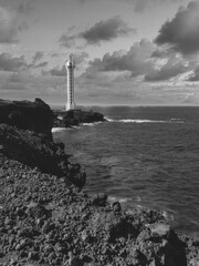 lighthouse on the volcanic beach of La Palma island