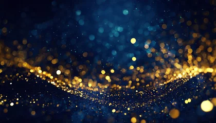 Poster abstract background with Dark blue and gold particle. Christmas Golden light shine particles bokeh on navy blue background. Gold foil texture. © netsay