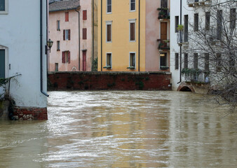 High level of the water of River called RETRONE in Vicenza City during flood and the bridge called...
