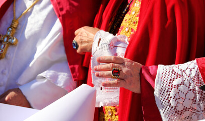 hand of a bishop in clerical dress blessing the faithful - obrazy, fototapety, plakaty