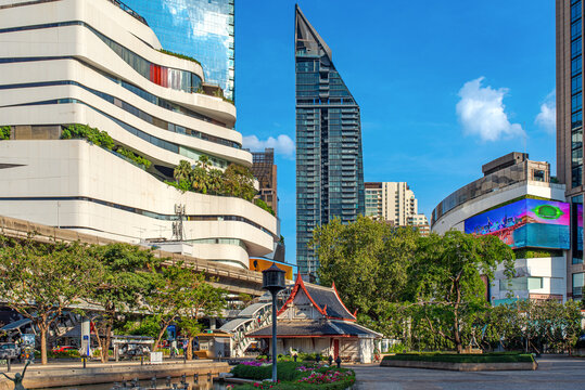 Skyscraper and shopping malls at the Phrom Phong BTS station in the Sukhumvit road in Bangkok. The Station is also entrance point of the Benchasiri Park with numerous works of public art.