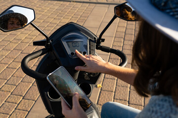 Dashboard of four wheel mobility electric scooter.