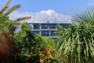 View of buildings and houses in public places in Turkey, sunny summer day