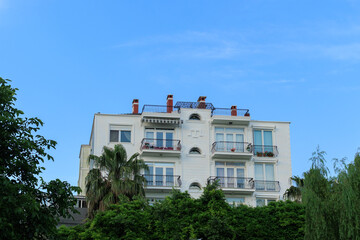 View of buildings and houses in public places in Turkey, sunny summer day