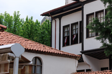 View of buildings and houses in public places in Turkey, sunny summer day
