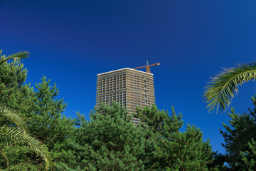View of buildings and houses in public places in Turkey, sunny summer day