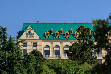 View of buildings and houses in public places in Turkey, sunny summer day