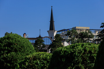 Fototapeta premium View of buildings and houses in public places in Turkey, sunny summer day