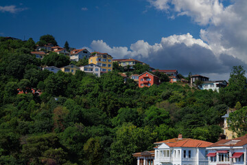 View of buildings and houses in public places in Turkey, sunny summer day