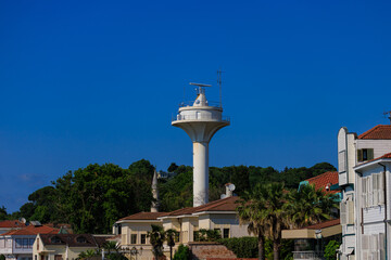 View of buildings and houses in public places in Turkey, sunny summer day