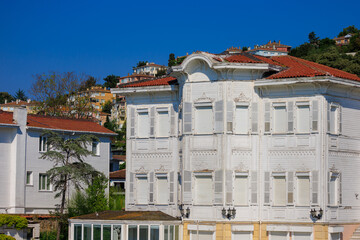View of buildings and houses in public places in Turkey, sunny summer day