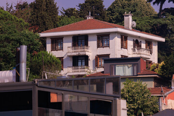 View of buildings and houses in public places in Turkey, sunny summer day