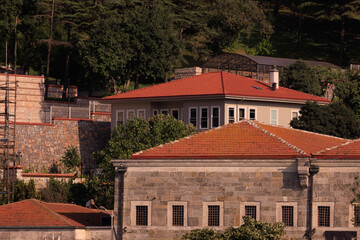 View of buildings and houses in public places in Turkey, sunny summer day
