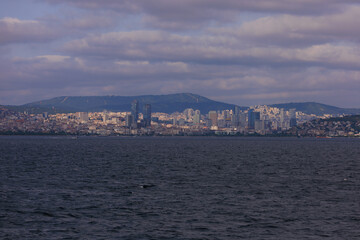 Fototapeta premium Cityscape View from the water to buildings in the city of Istanbul 
