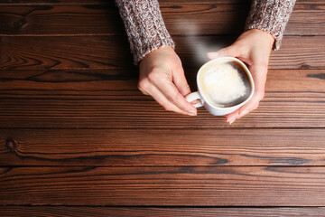 a female hands and coffee