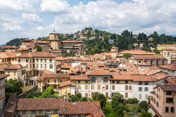 Fototapeta na wymiar View of Bergamo from the Campanone tower, which offers visitors a breath-taking view of the old town (Citta Alta), Lombardy, Italy