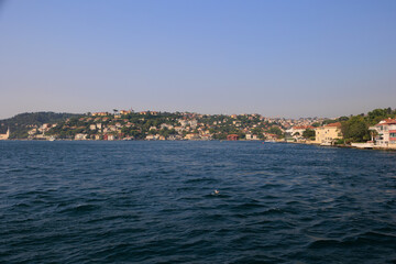Fototapeta na wymiar Cityscape View from the water to buildings in the city of Istanbul 