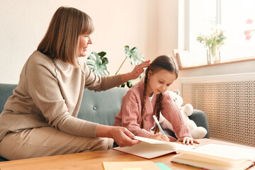 Family at home. Mom daughter and granddaughter at home.