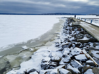 landscape with pier and frozen sea - Lysaker